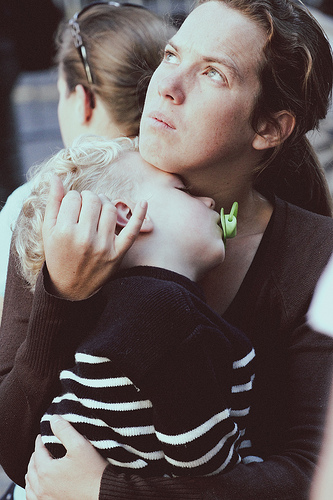 mother holding child